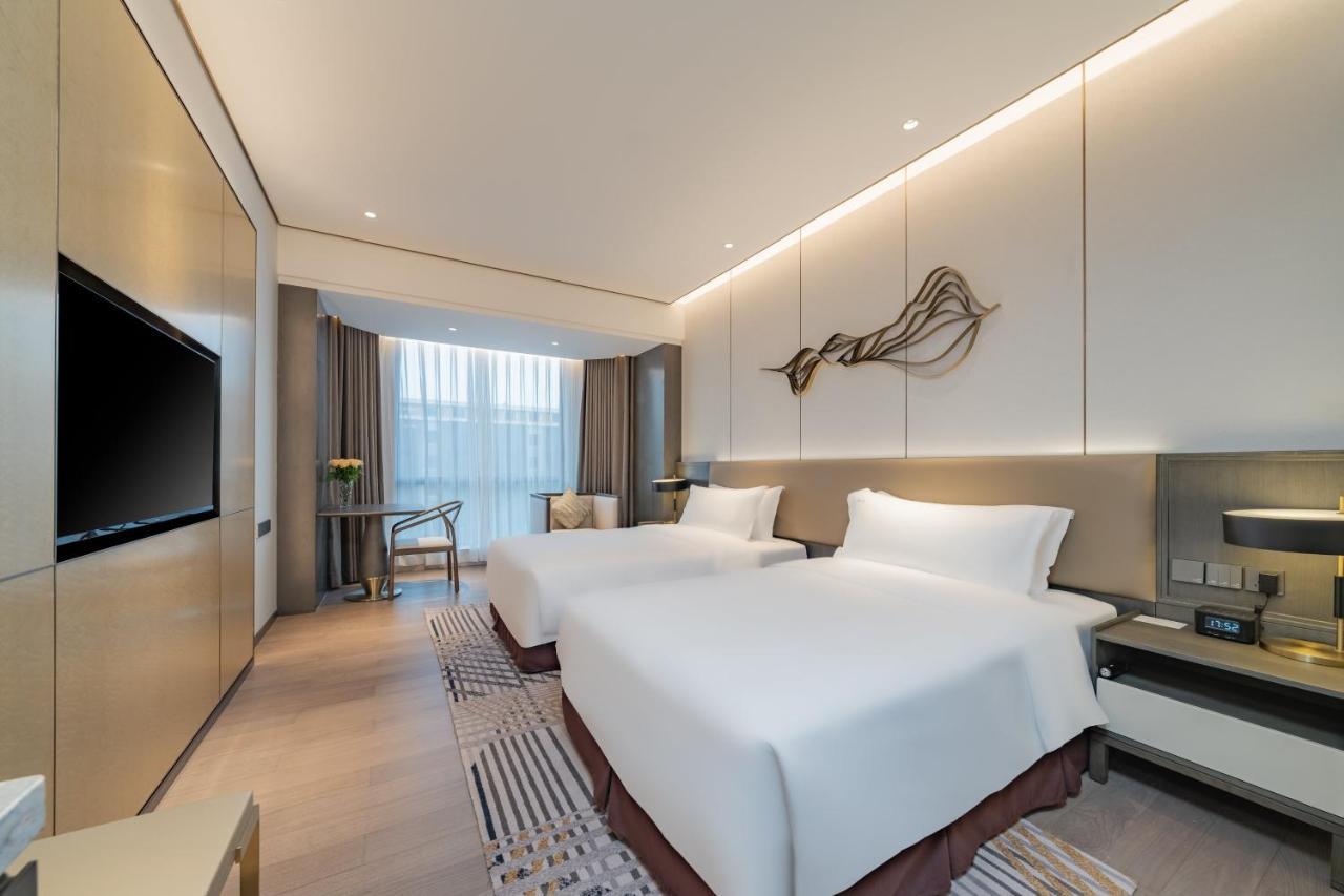 Holiday Inn Zhengzhou Zhongzhou By Ihg Екстериор снимка