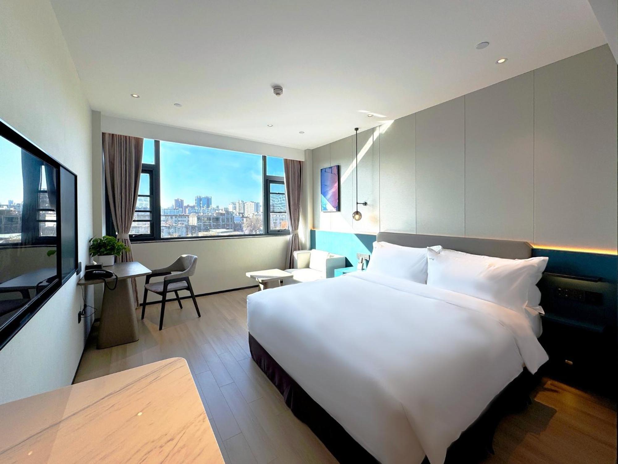 Holiday Inn Zhengzhou Zhongzhou By Ihg Екстериор снимка